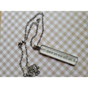 Queer Art is Art pendant necklace made with Husband Material book pages